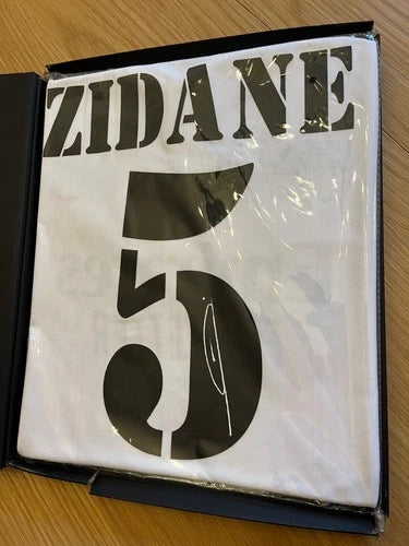 Signed Zinedine Zidane Real Madrid jersey with Icons Coa